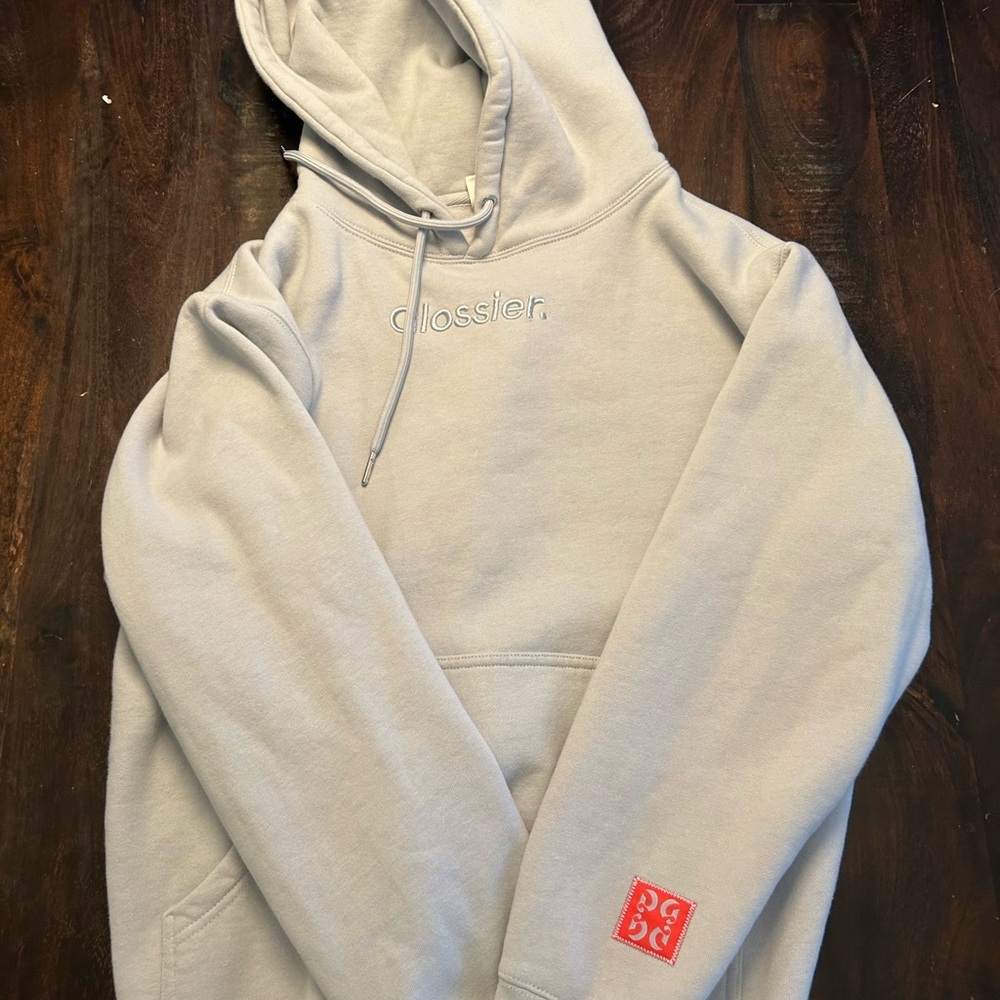 Light blue London exclusive Glossier hoodie